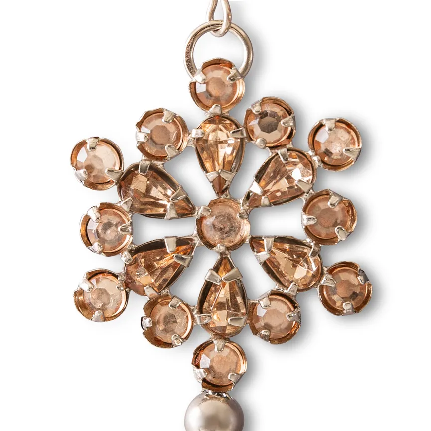 Quaste rosegold detail