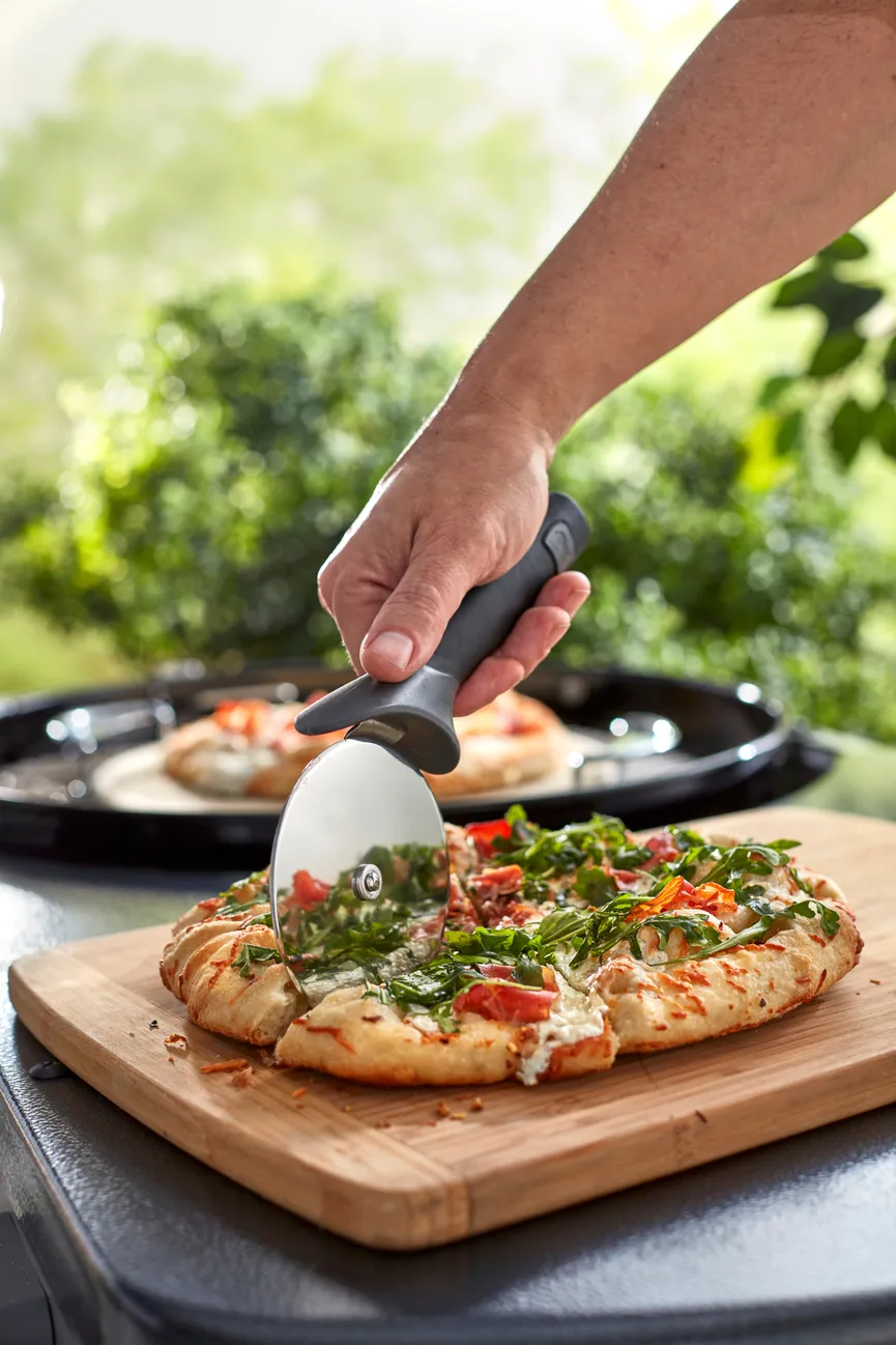 Pizzaschneider m. erg. Griff milieu